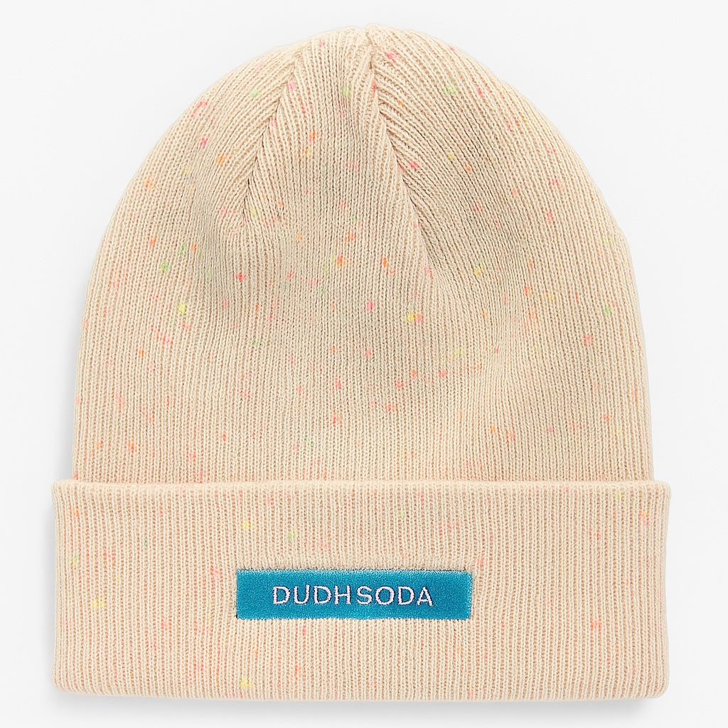 Beige beanie with a blue label on a light gray background